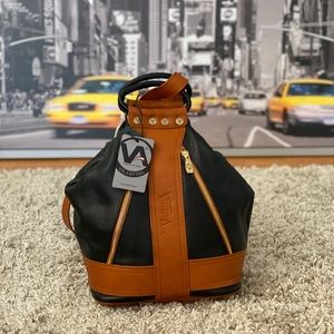 Valentina leather sling backpack , NEW